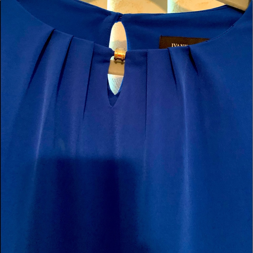 Nice color blouse for a women.from  ivanka  trump